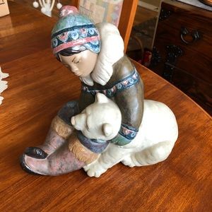 Lladro “Eskimo boy with bear.”